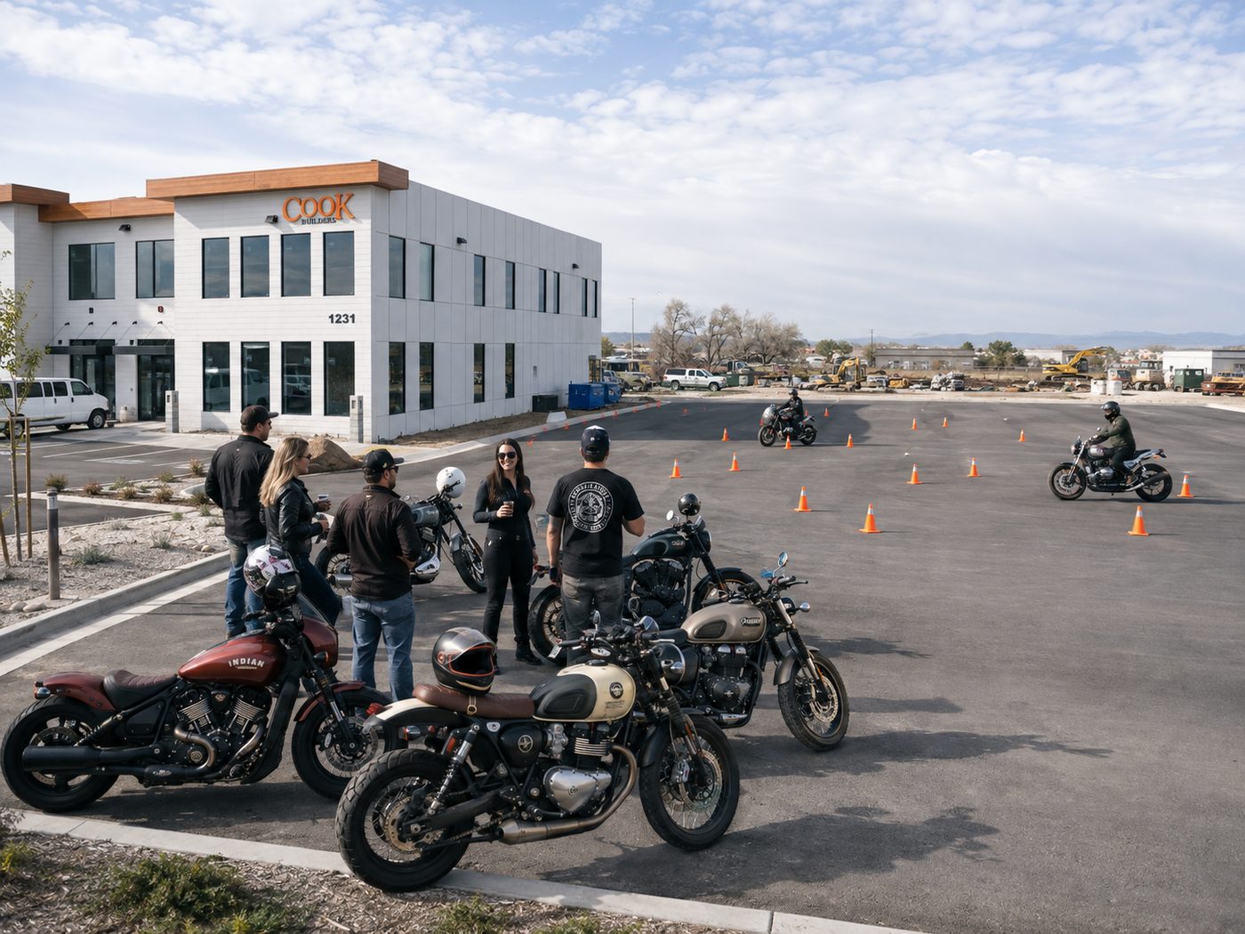 The training lot with cone courses running and riders gathered in the foreground